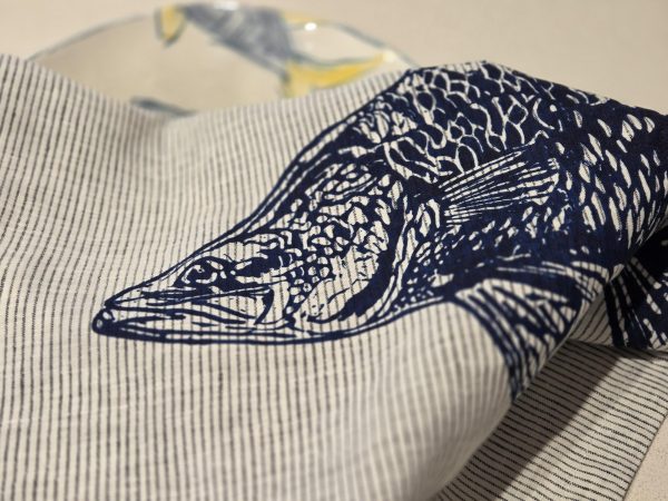 Hand screen-printed linen tea towel with Australian barramundi design